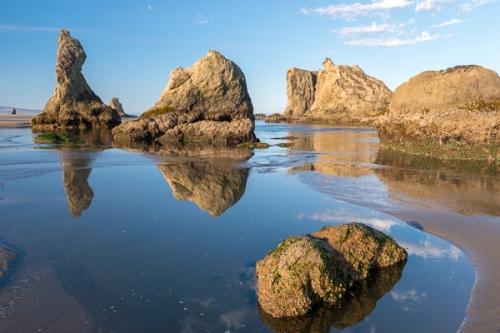 Beach;Blue;Boulder;Boulders;Brown;Calm;Cloud;Cloud Formation;Clouds;Coast;Coastline;Geological;Geology;Healing;Health care;Healthcare;Mirror;Nature;Ocean;Oregon;Pastoral;Ripple;Rock;Rock formations;Rocks;Sand;Sea;Sea Stacks;Seascape;Stone;Stones;Tan;Water;Waterscape;Waves;Weather;Yellow;beach;beaches;coast;coastline;green;landscape;oneness;orange;peaceful;pool;reflection;reflections;restful;sea;serene;shore;shoreline;sky;soothing;tranquil;zen